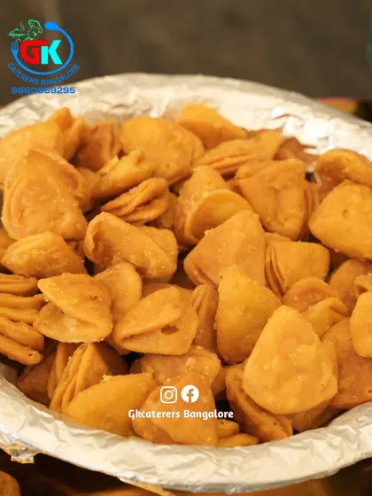 A bowl of crispy, savoury snacks, perfect for munching on during an event.