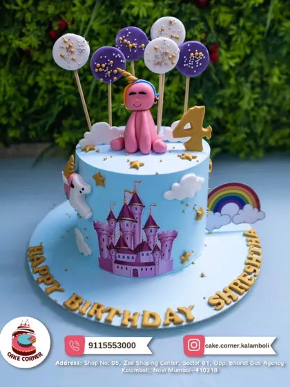 A magical unicorn and castle cake for Shreshtha's 4th birthday. The edible castle print, fondant unicorn, and rainbow make it a fairytale dream come true.