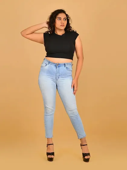 A confident full-body pose. The makeup is minimal, perfect for agency digitals.