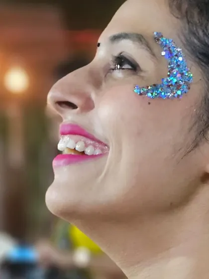 A high-quality close-up of the blue glitter moon design, showing the different sizes of glitter used.