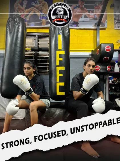 Our female fighters are a core part of the Iron Fist family. Here they are, gloved up and ready, demonstrating the focus and determination that defines our team.