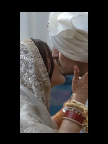 A close-up, artistic shot of a couple's almost-kiss, a moment filled with anticipation and love.