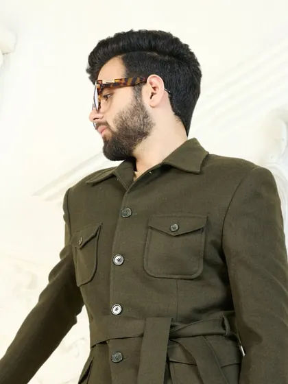 Olive green is more than a color; it’s a mood. This belted safari-style co-ord set is designed to turn heads with its unique silhouette and comfortable fabric that transitions seamlessly from day to night.