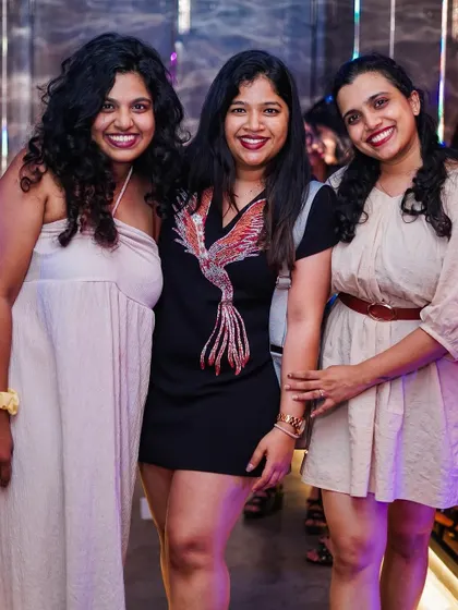 A group of ladies enjoying their night out, with smiles all around.