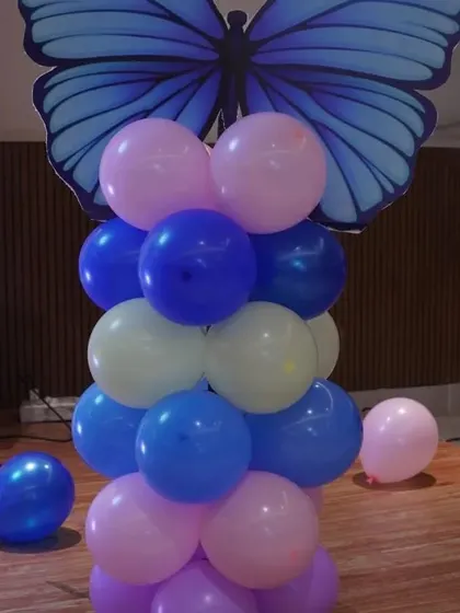 A simple but beautiful butterfly balloon column. These can be placed at the entrance or around the party area to extend the theme throughout the space.