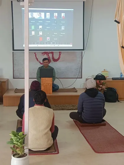 A closer look at our hybrid medical yoga workshop. I use a projector to ensure that my online students are fully integrated into the class, receiving the same level of attention as those present in the shala.