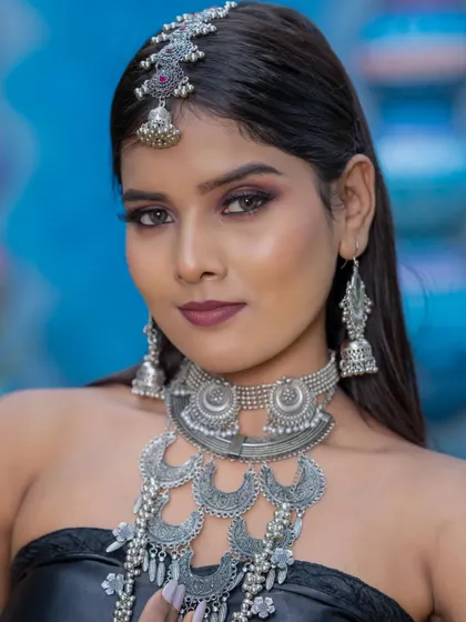A stunning look with oxidized silver jewelry created by my students on influencer Madhu. The smoky eye and bold jewelry create a powerful, bohemian vibe.