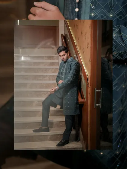 A creative, layered portrait of the groom against a staircase. This composition adds depth and a contemporary feel to a classic groom getting-ready shot.
