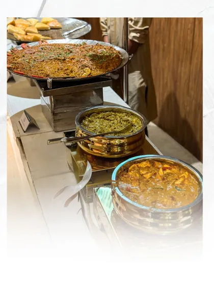 A display of some of my signature Punjabi dishes. You can see a rich paneer curry, a wholesome dal, and a flavorful tawa vegetable preparation, ready to be served.
