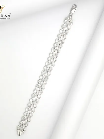 A substantial men's silver bracelet with a modern, woven-style link. This piece is designed for elegance and durability.