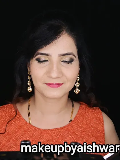 A full view of this soft party makeup. The focus is on the gently smoked-out eyeshadow with a touch of shimmer, creating a sophisticated look.