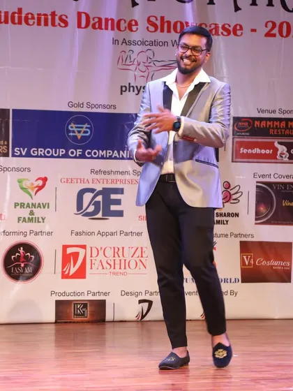 Our founder on stage, addressing the audience at the "Students Dance Showcase 2024." We are passionate about creating a platform for our students.
