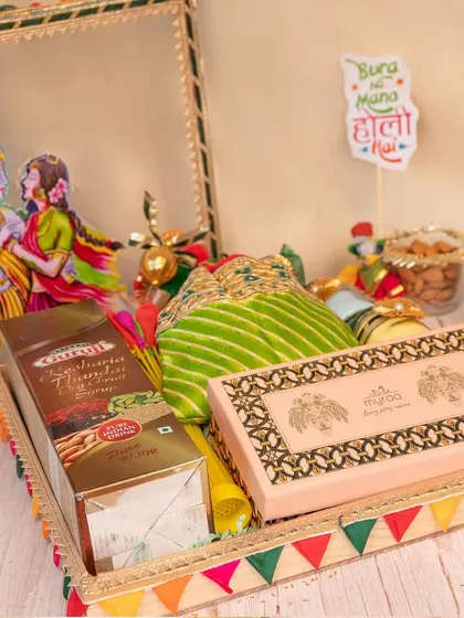 Holi is a festival of pure joy and color, and my hampers reflect that. This festive tray includes traditional thandai mix, organic gulal, and sweet treats, all arranged with playful details to make your celebration vibrant and special.