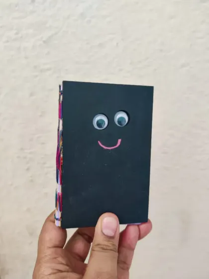 A cute little handmade book with googly eyes, because why not?