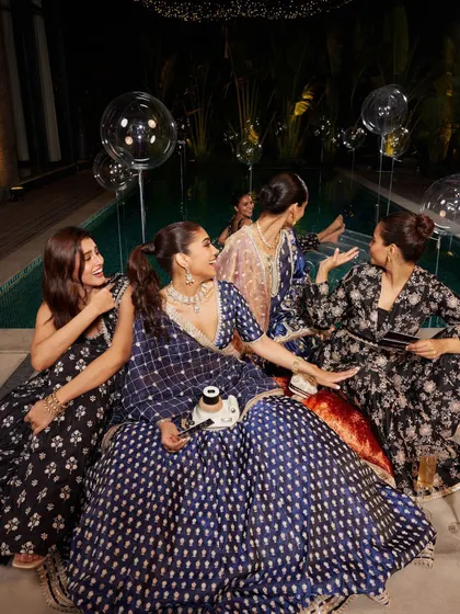More behind the scenes fun with the bride squad by the pool. These are the candid moments you'll cherish forever.