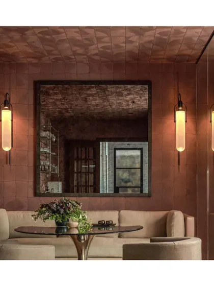 The 'Atlas' wallpaper has an earthy, rustic texture that is perfect for creating a warm and inviting dining nook. Its tactile quality adds a layer of comfort and sophistication.