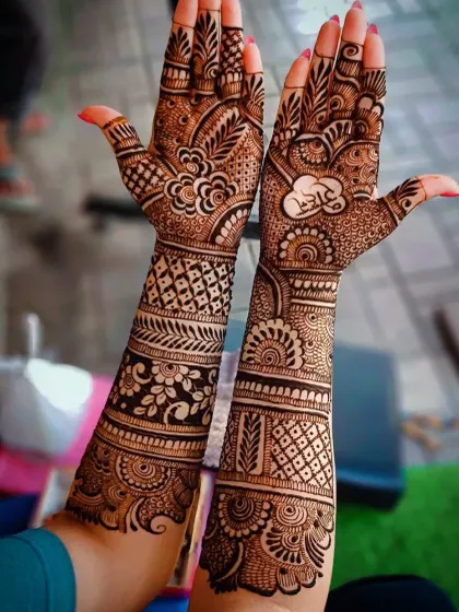 A slightly different angle of the 'Ram' mehandi design, showing the flow of the patterns.