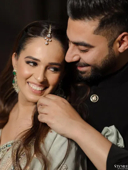 A beautiful close-up capturing the bride's joyful expression and the groom's loving gaze. This shot is all about the emotion and connection of the moment.