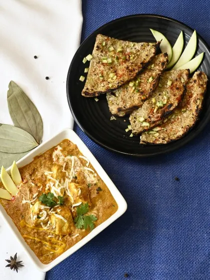 A symphony of flavours: Paneer Mango Tikka paired perfectly with zesty Lasooni Kairi Paratha.