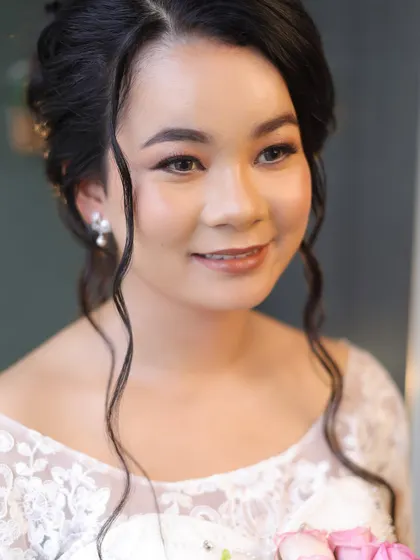 For my Catholic brides, I focus on creating a look of serene grace. This soft glam makeup enhances natural beauty with luminous skin and gentle hues, creating a timeless and angelic presence for your walk down the aisle.