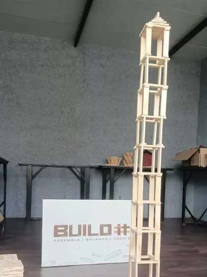 A single, tall tower stands as a monument to focus and persistence. Building structures like this requires a steady hand and a clear mind, making it a meditative and rewarding experience.