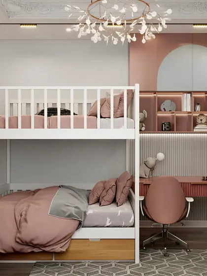 A lovely pink-themed bunk bed with a shared study desk for two. The design is perfect for sisters, providing both a comfortable sleeping area and a dedicated space for homework.