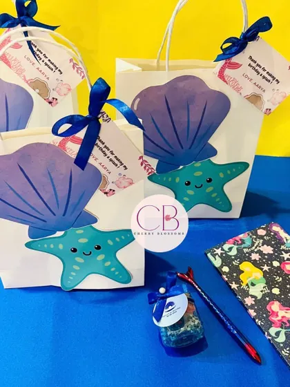 These mermaid-themed return favour bags were shipped to a client in Chennai. Each bag was filled with a mermaid-themed diary, a special pen, and a jar of our handmade ocean-themed chocolates.