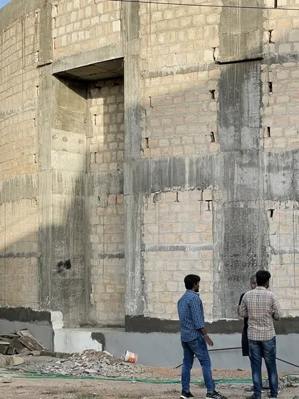 The House of Galleries takes its form from locally sourced bela stone blocks. The fenestrations are designed to make the house appear as a solid mass from the outside.