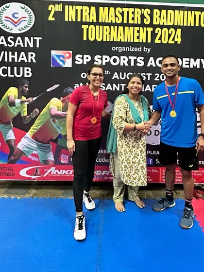 Mixed Doubles Group C & D winners and runners-up from the Intra Masters Tournament.