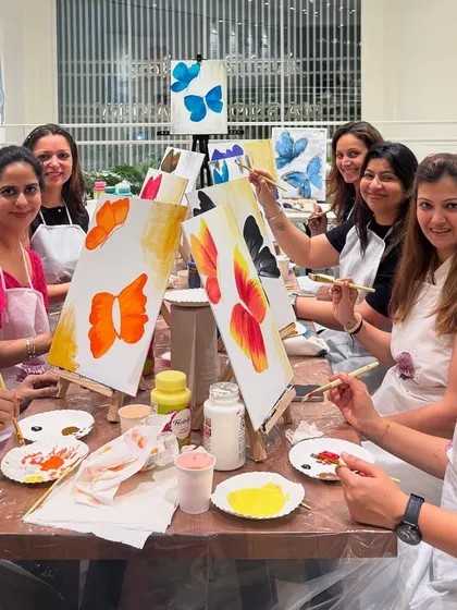 We hosted a cozy, late-night paint party for a group of friends at Magnolia Bakery in Mumbai. It was a chill night of painting butterflies, adding gold leaf, and chatting until past midnight.