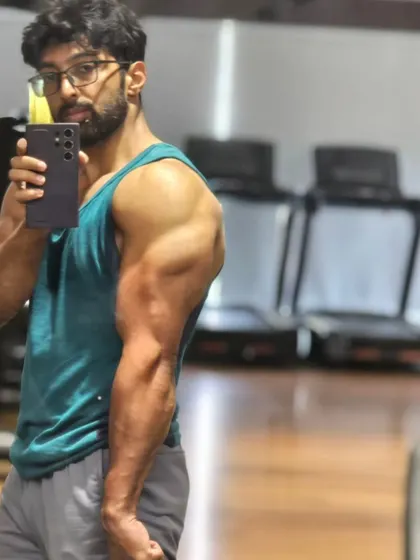 It's pump time. A side tricep and shoulder shot to check the progress from an arm workout.