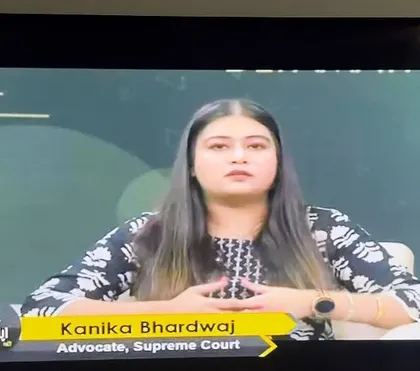 Focused and ready to present my views during a panel discussion on defamation. It is vital to have clear, fact-based conversations on such important legal topics.