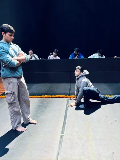 A moment of instruction during a concert week in Mumbai. Here, I am working with a dancer on body alignment and posture, which are fundamental to creating clean lines in Bharatanatyam.
