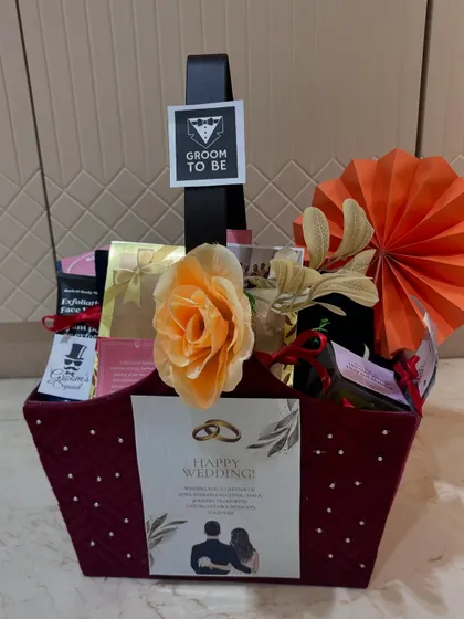 Another angle of the groom-to-be hamper, showing the thoughtful arrangement of gifts and the "Happy Wedding" card. It’s a sophisticated gift for any groom.