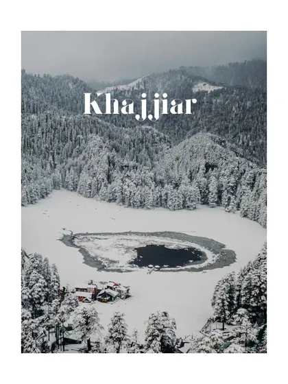 An establishing shot of the stunning, snow-covered landscape of Khajjiar. This highlights the epic scale of the locations we travel to for destination pre-wedding photography.