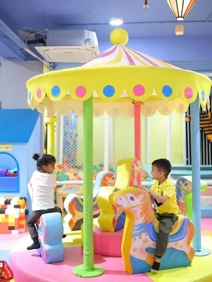 A full view of our charming mini carousel, a centerpiece of gentle fun that kids of all ages adore.