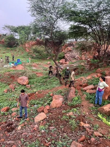 A view of a mined-out quartzite pit at Aravali Nagar Van, where children from charity schools came to plant native species like dhok and dhoodhi with high energy.