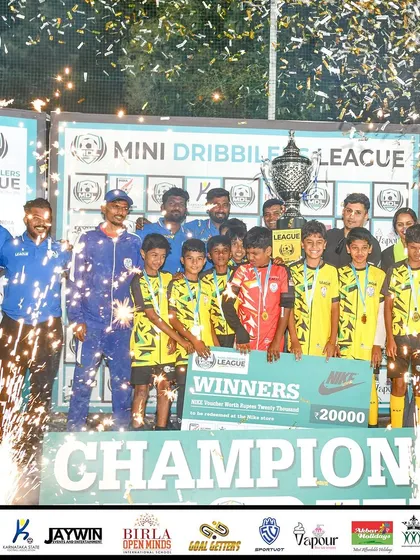Confetti rains down as our U13 team celebrates their championship victory at the Mini Dribblers League.