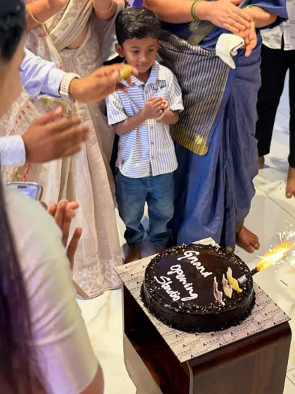 Celebrating the official opening of the studio with a cake. This moment was the sweet culmination of a lot of hard work and the beginning of a beautiful new adventure.