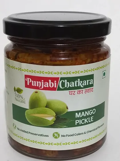 For larger needs, I offer my pickles in 500g jars. This is my 100% natural Mango Pickle, a popular choice for bulk orders, providing that same 'ghar ka swad' in a bigger size.