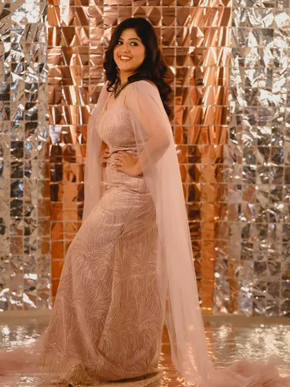 The complete look. This photo showcases the beautiful flow of the gown and how the hair and makeup work together to create a cohesive, stunning look.