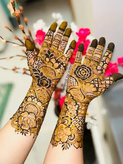A beautiful non-bridal Indian design with a mix of florals, checks, and leafy patterns. The composition is so balanced and pretty.