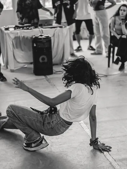 The cypher is where individual style comes alive. This moment from a Spectra dance battle captures the raw energy and freedom of freestyle. It's a space to test your skills, express yourself, and feel the support of the entire community.