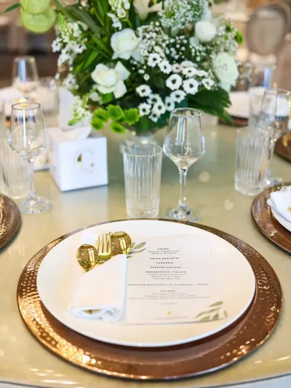 Every element on the table is thoughtfully chosen. From the elegant glassware to the neatly folded napkins with custom rings, we ensure the visual appeal of the dining table matches the quality of our cuisine.