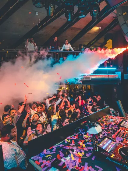 From my view at the decks, a smoke cannon blasts over the excited crowd. It's all about creating those high-impact, memorable moments.