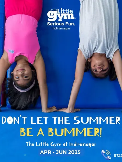 "Don't let the summer be a bummer!" Two girls hang upside down on an air track, showcasing the exciting activities at our summer camps.