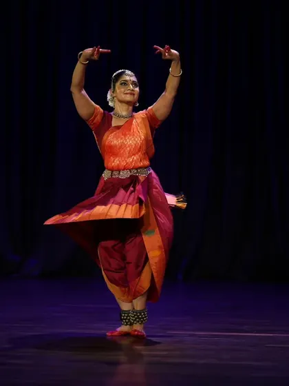 A mesmerizing moment from "Akhyat Akhyana," a performance that ignites the stage with fiery energy and soulful expression, bringing the powerful poetry of women to life.
