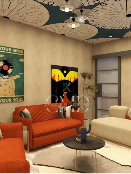 A different view of the lounge, showing the mix of a vibrant orange chevron sofa with a neutral, modern couch, creating a dynamic yet balanced space.