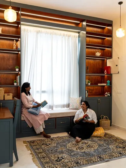 A duplicate of image 205, showcasing the library as a lived-in, comfortable space for reading and relaxing.