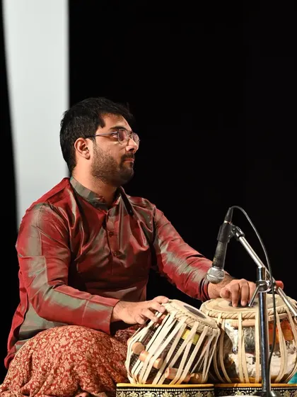 Performing on stage with my tabla set, miked and ready. This was from a concert with Pandit Jayateerth Mevundi, where my role was to provide a solid rhythmic foundation for his vocal artistry.